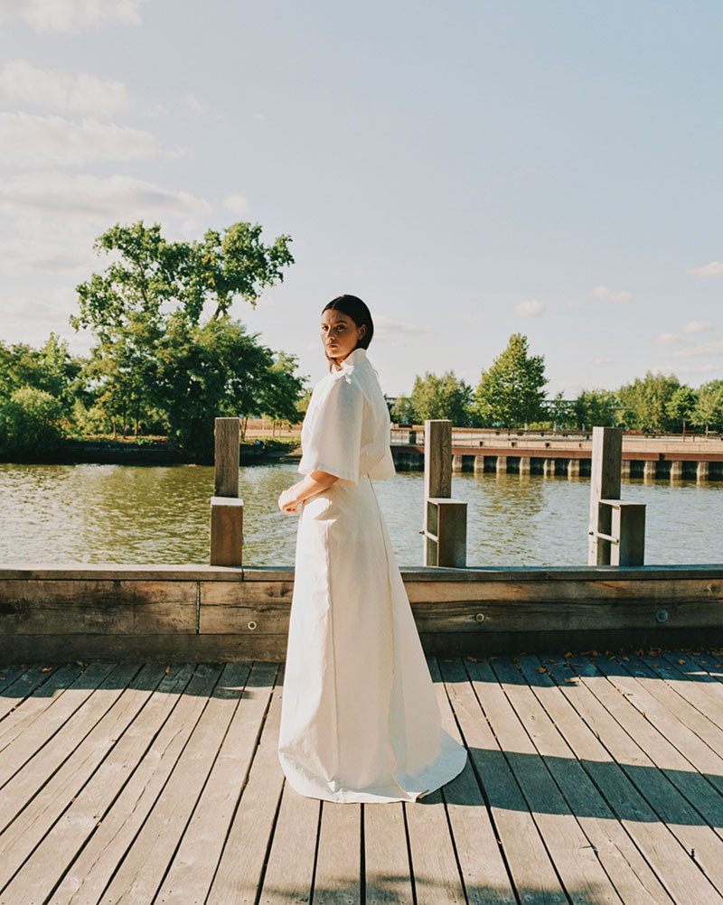 Wrap skirt in cotton with diagonal box pleat back detail